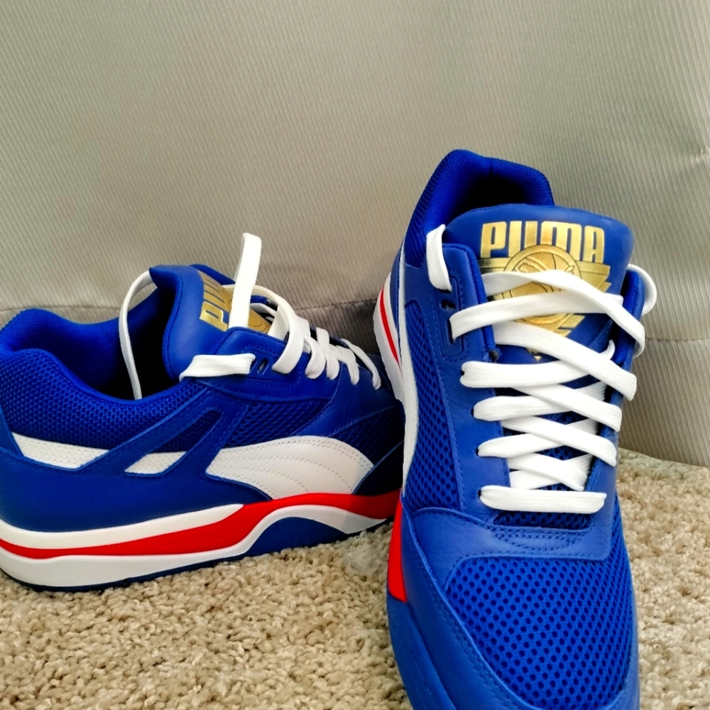 Men's size 9 red white and blue pumas.